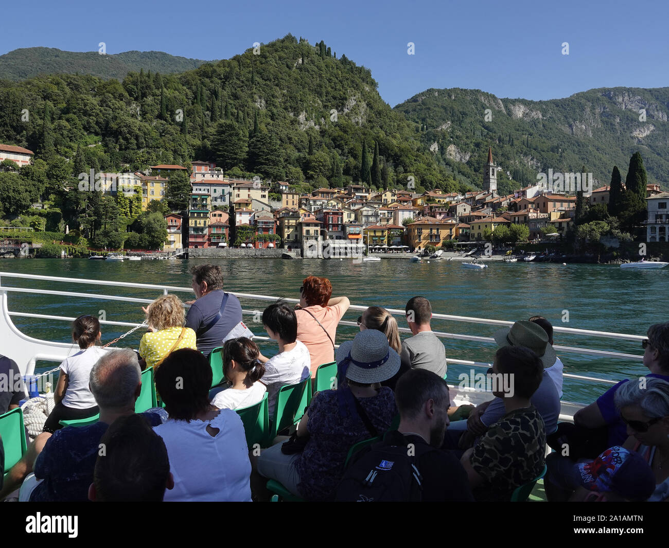 Ferryboat taxi tourists await disembarking in Varenna on Italy's iconic