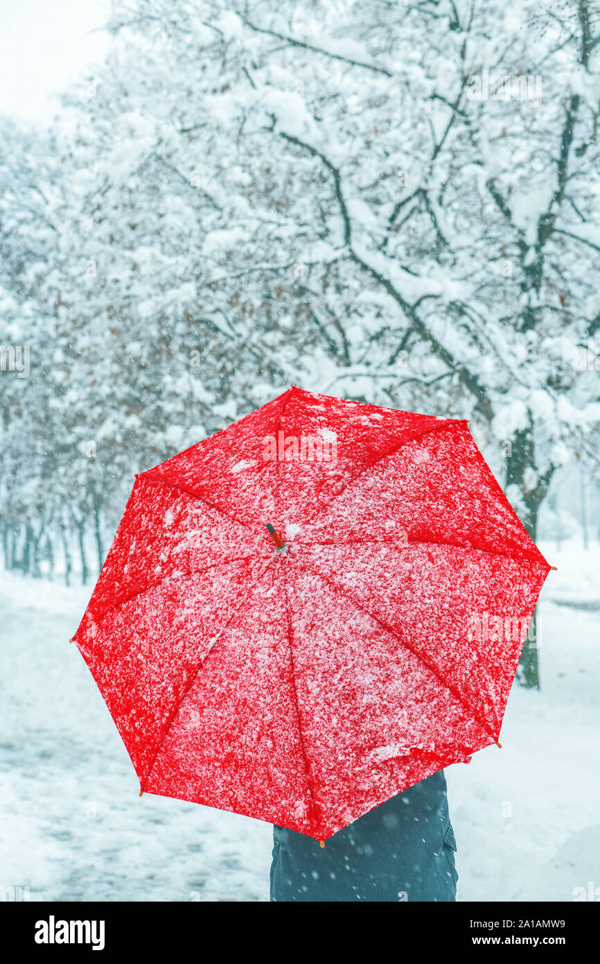Red umbrella winter snow hires stock photography and images Alamy