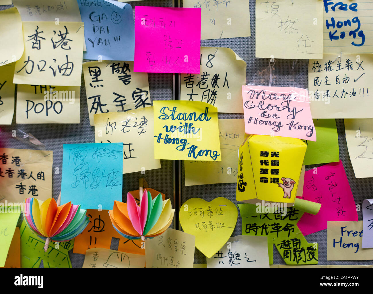 Pro democracy and anti extradition law protests, slogans and posters on Lennon Walls in Hong Kong. Pic Lennon Wall protest notes at City University of Hong Kong. Stock Photo