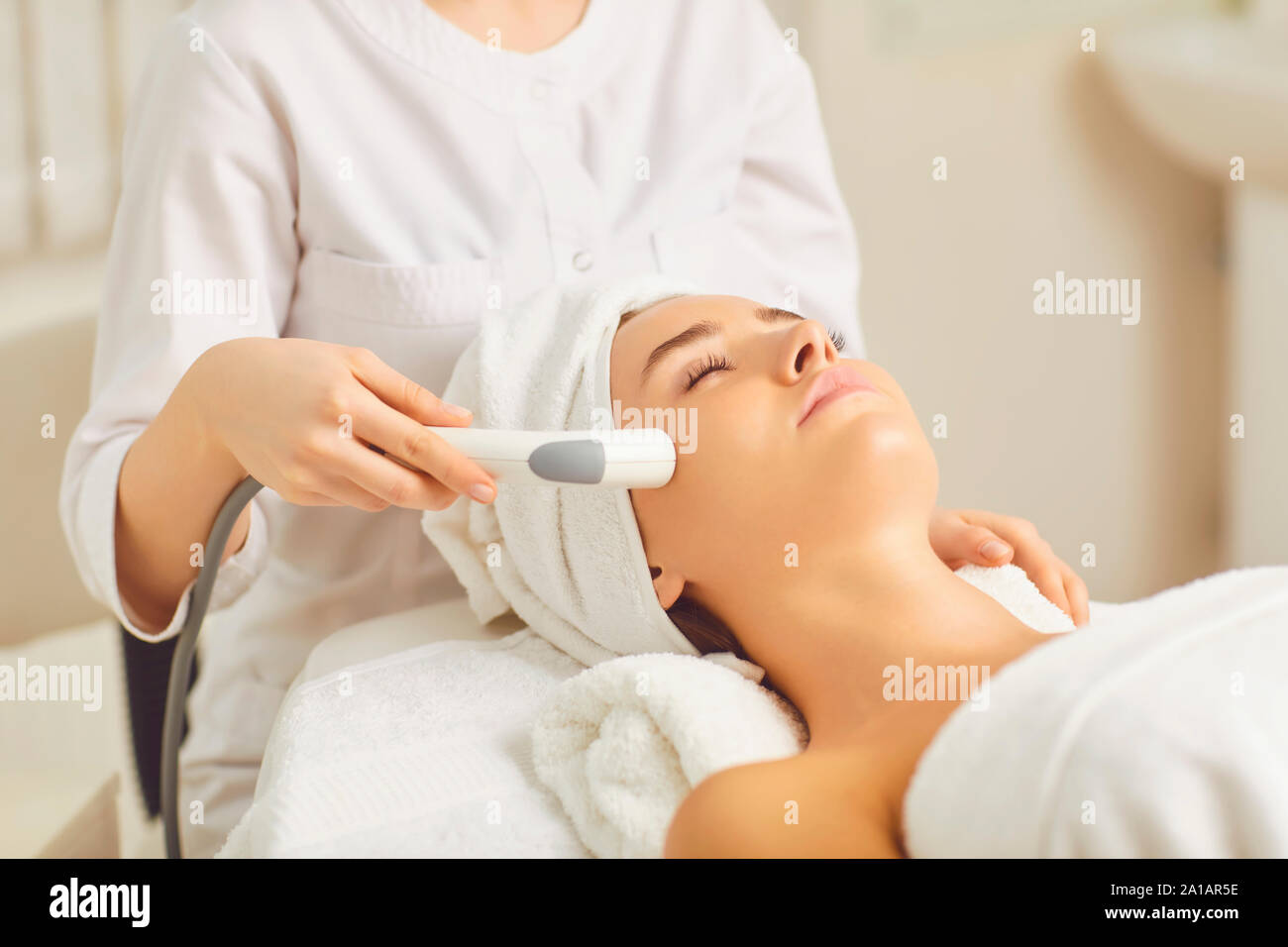 Hardware cosmetology. Cosmetology head procedure. Stock Photo