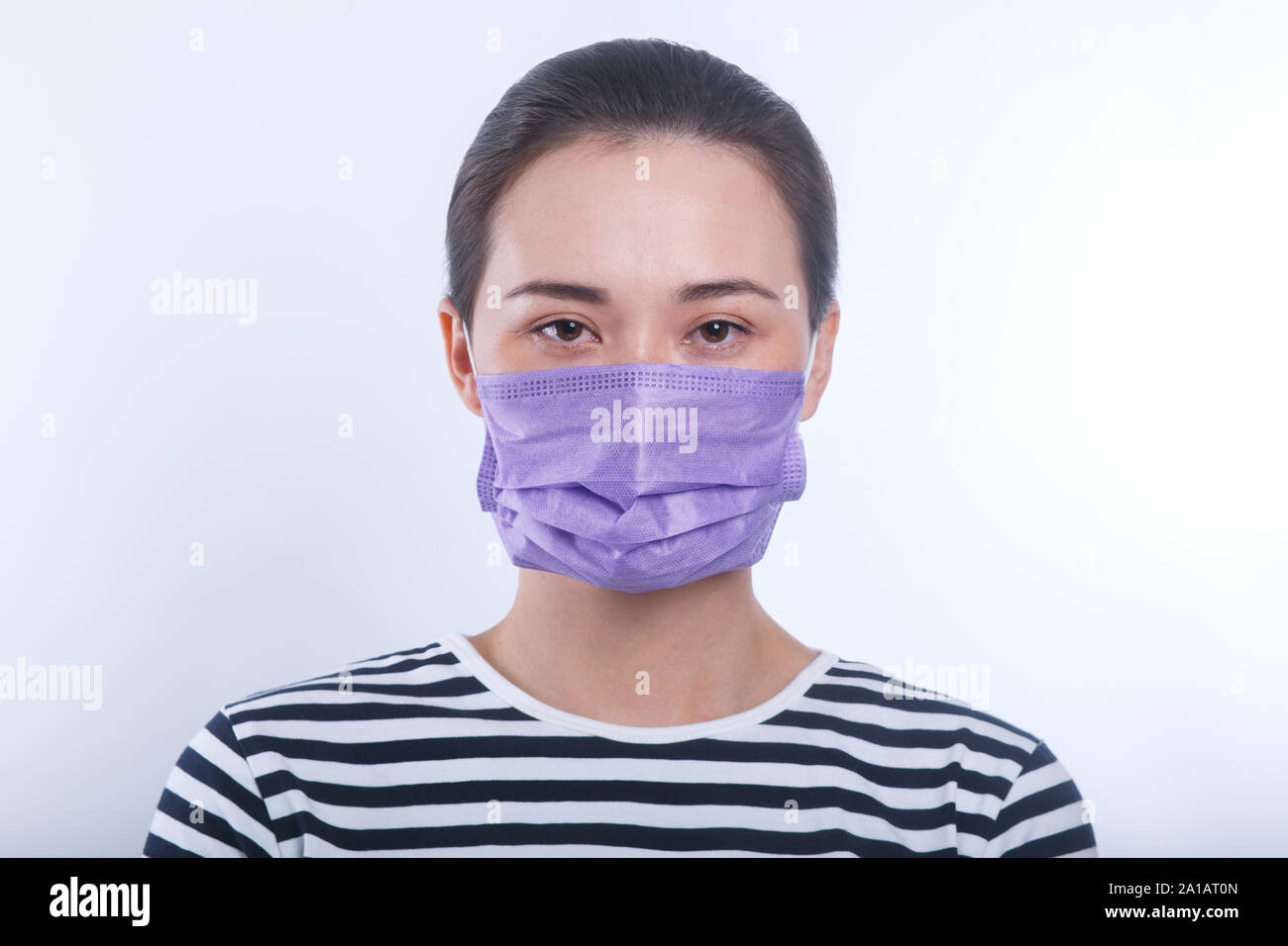 Asian woman wear protective face mask. on white background Stock Photo ...