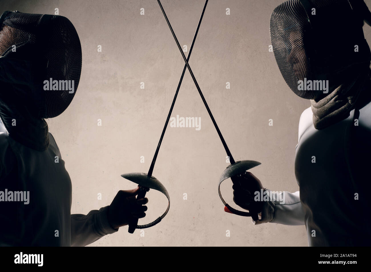 Fencer woman with fencing sword. Fencers duel concept Stock Photo Alamy