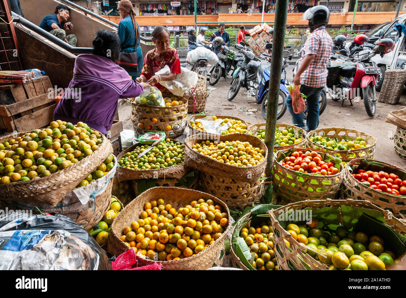 Women selling fruit and vegetables, at the Pasar Badung market in