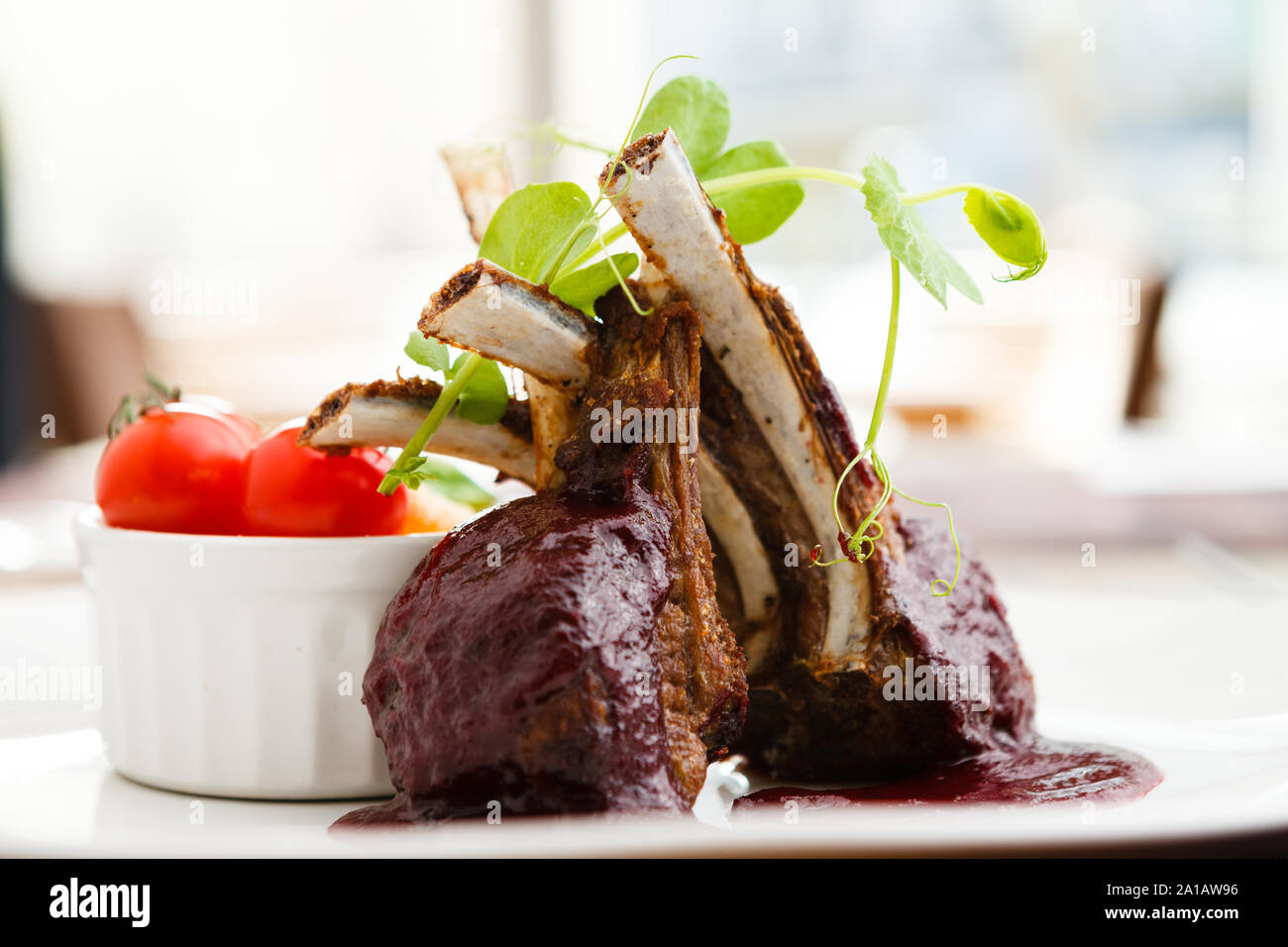 Grilled lamb with cranberry sauce Stock Photo Alamy