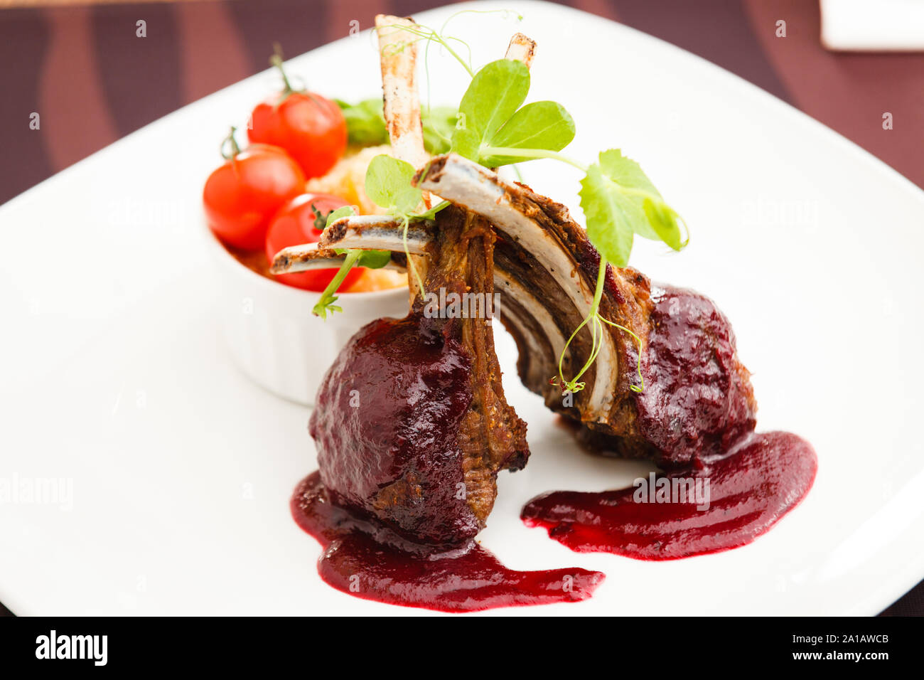 Grilled lamb with cranberry sauce Stock Photo Alamy