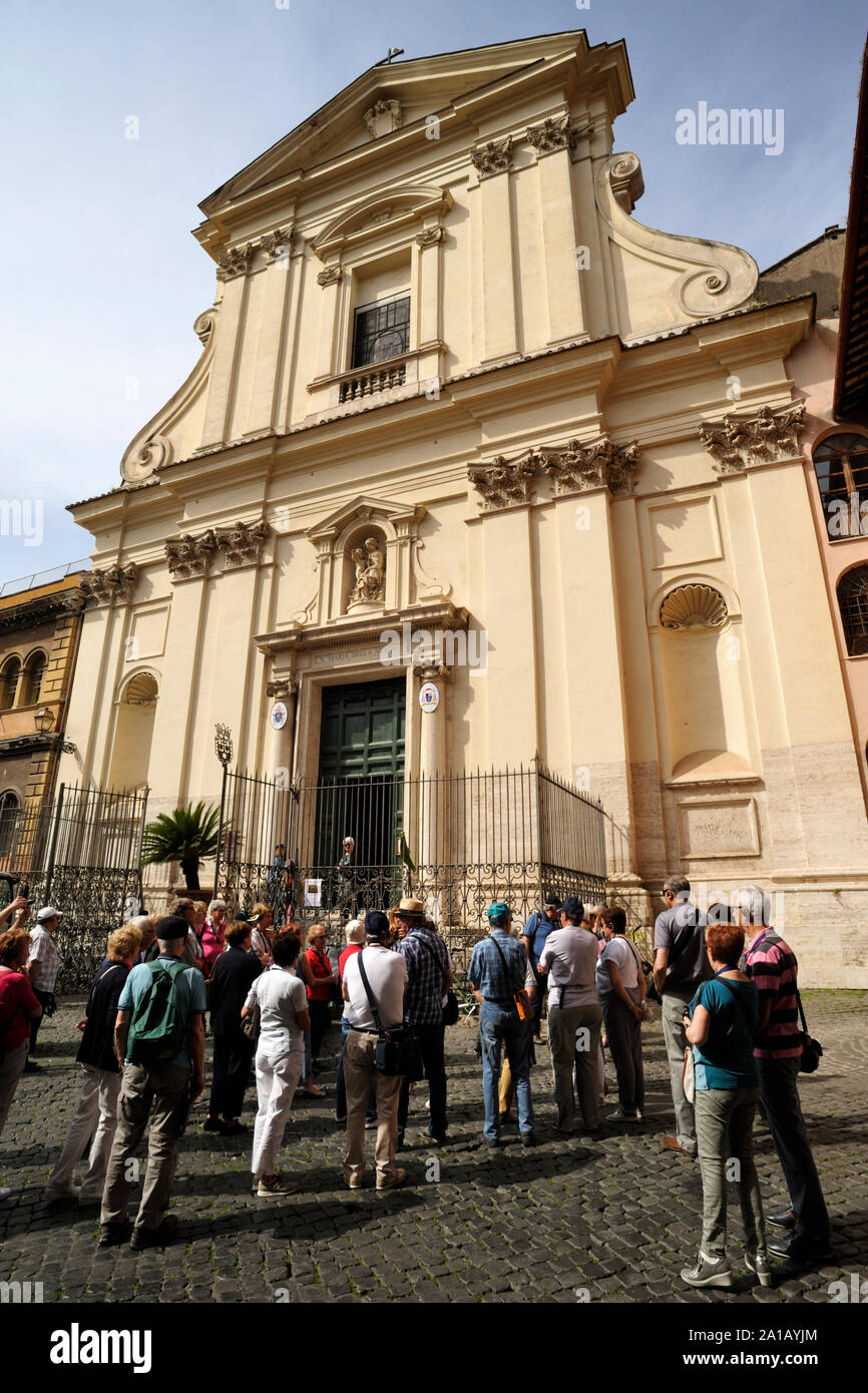italy, rome, trastevere, church of santa maria della scala, tourists Stock Photo