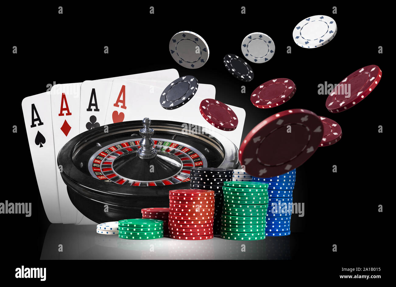 Four aces standing on mirror surface with backlight, behind of dark