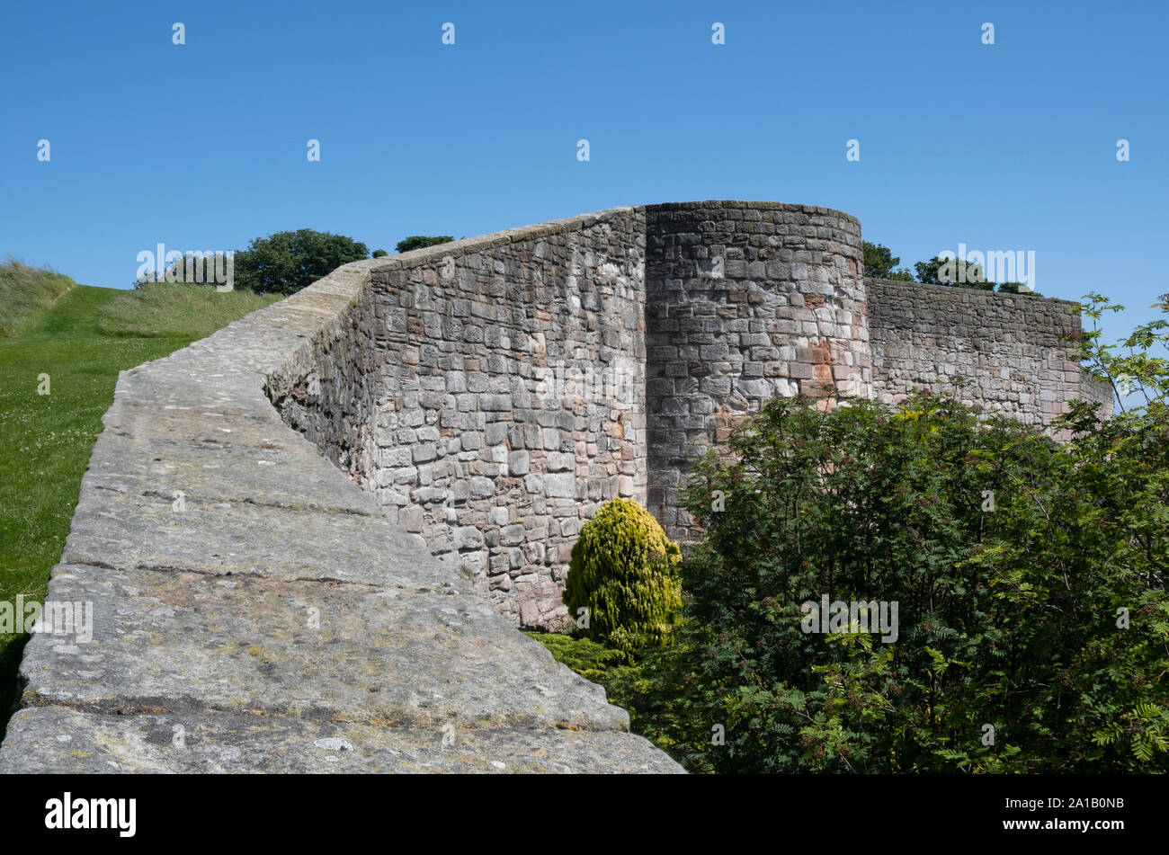 Medieval fortification defensive  stone walls of the city of Berwick-upon-Tweed the English border town in Northumberland England Stock Photo