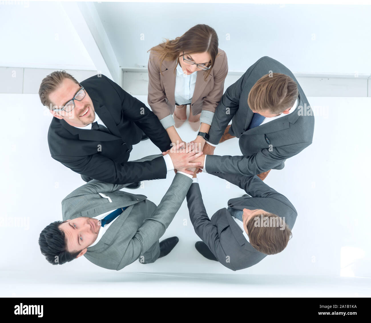 top view.the business team shows its unity Stock Photo - Alamy