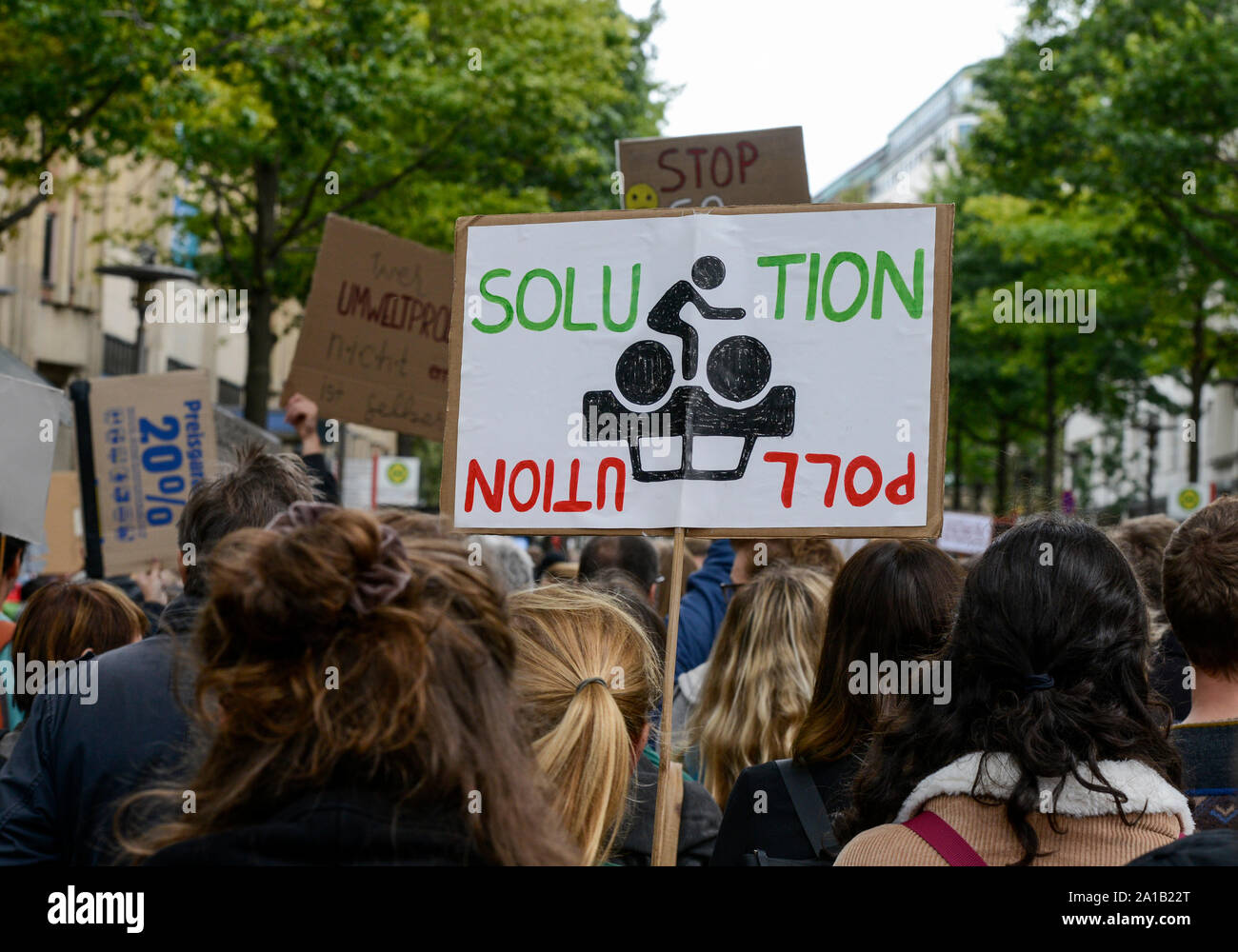 GERMANY, Hamburg city, Fridays for future movement, All for Climate rally with 70.000 protesters for climate protection , banner traffic policy, bicycle for solution, car for pollution Stock Photo