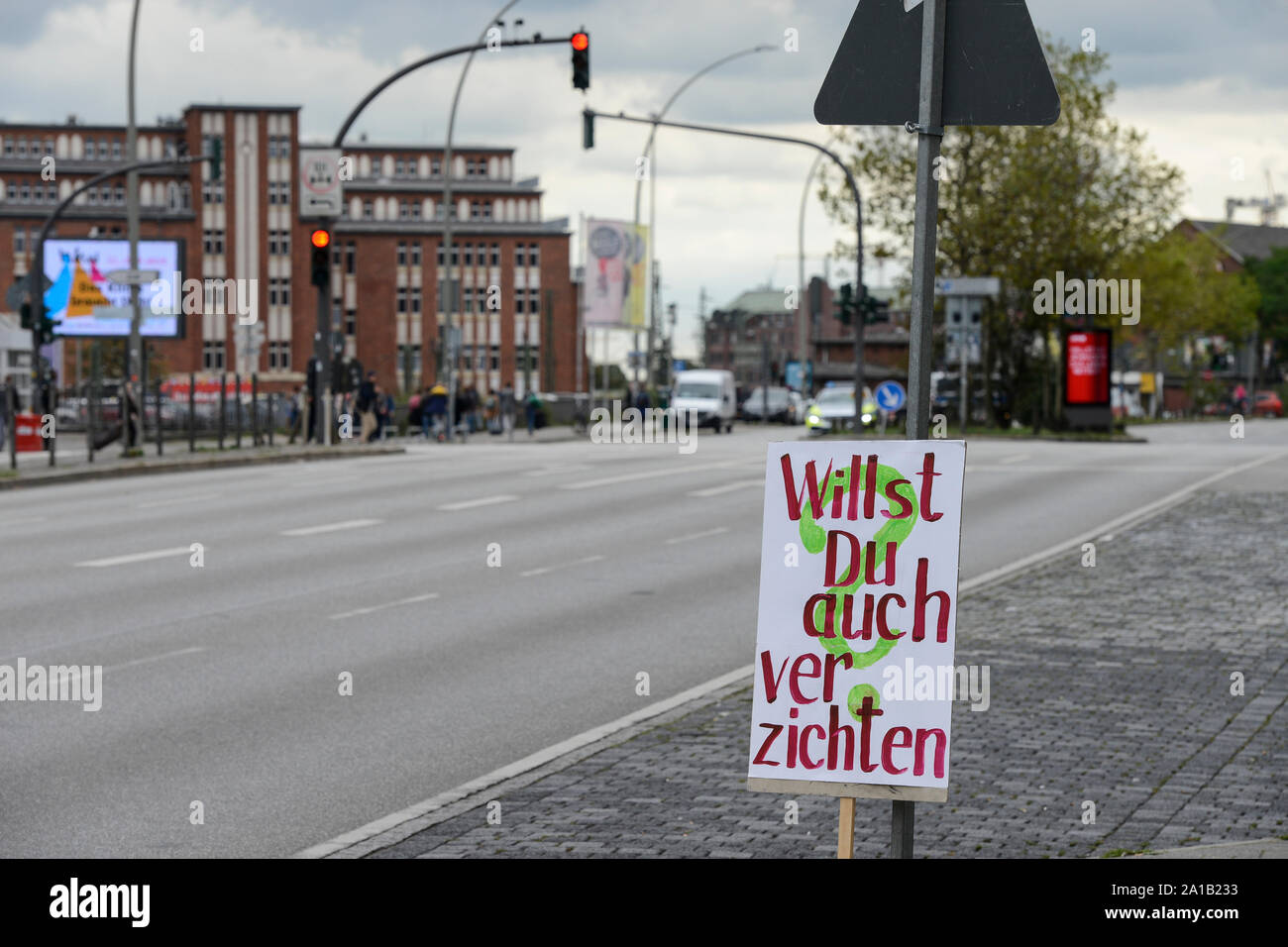 GERMANY, Hamburg city, Fridays for future movement, All for Climate rally with 70.000 protesters for climate protection, left banner on the road with slogan Do you want to give it up? less consumption more climate protection Stock Photo