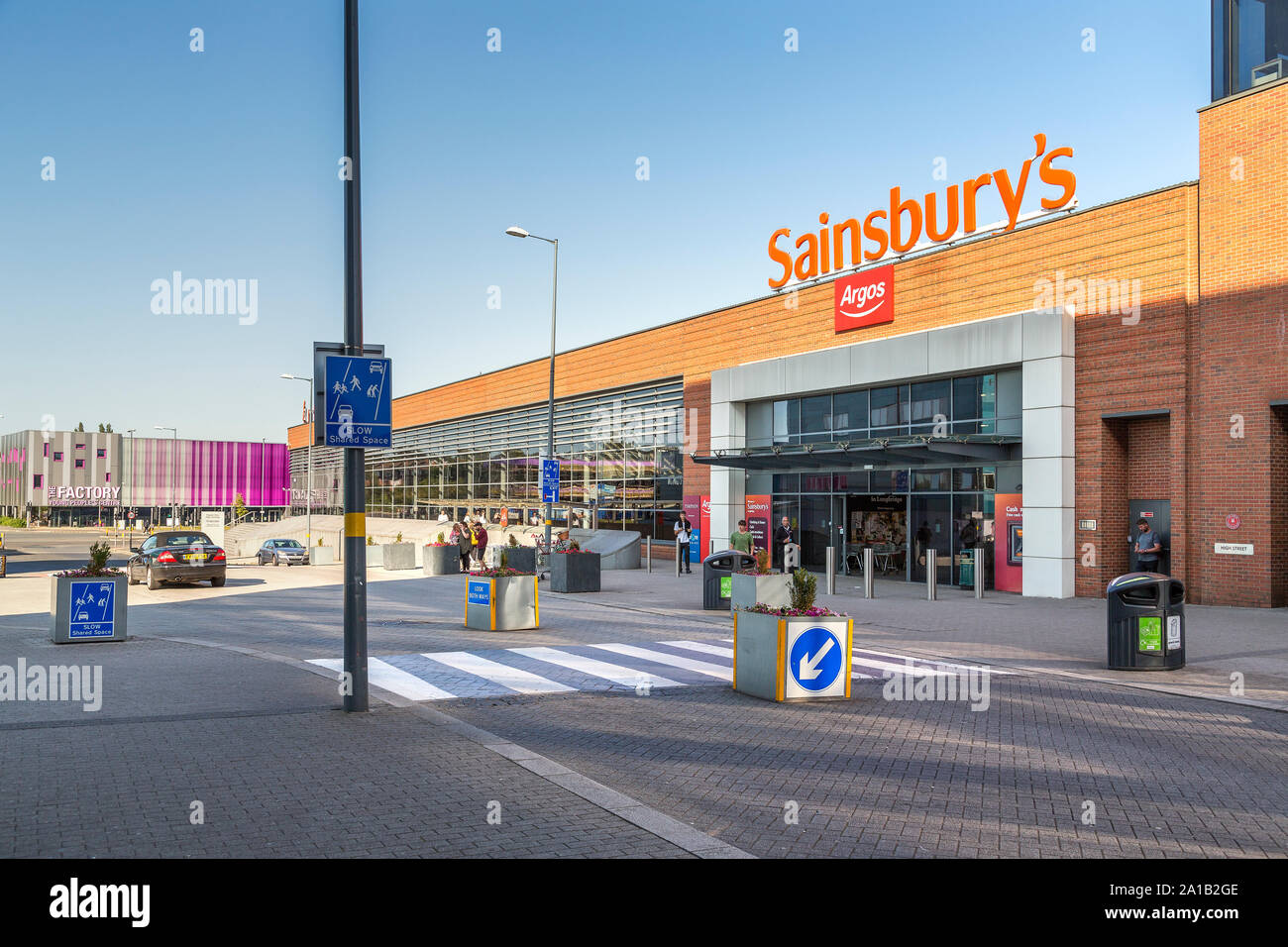 Longbridge town centre dominated by Sainsbury's superstore. The Factory