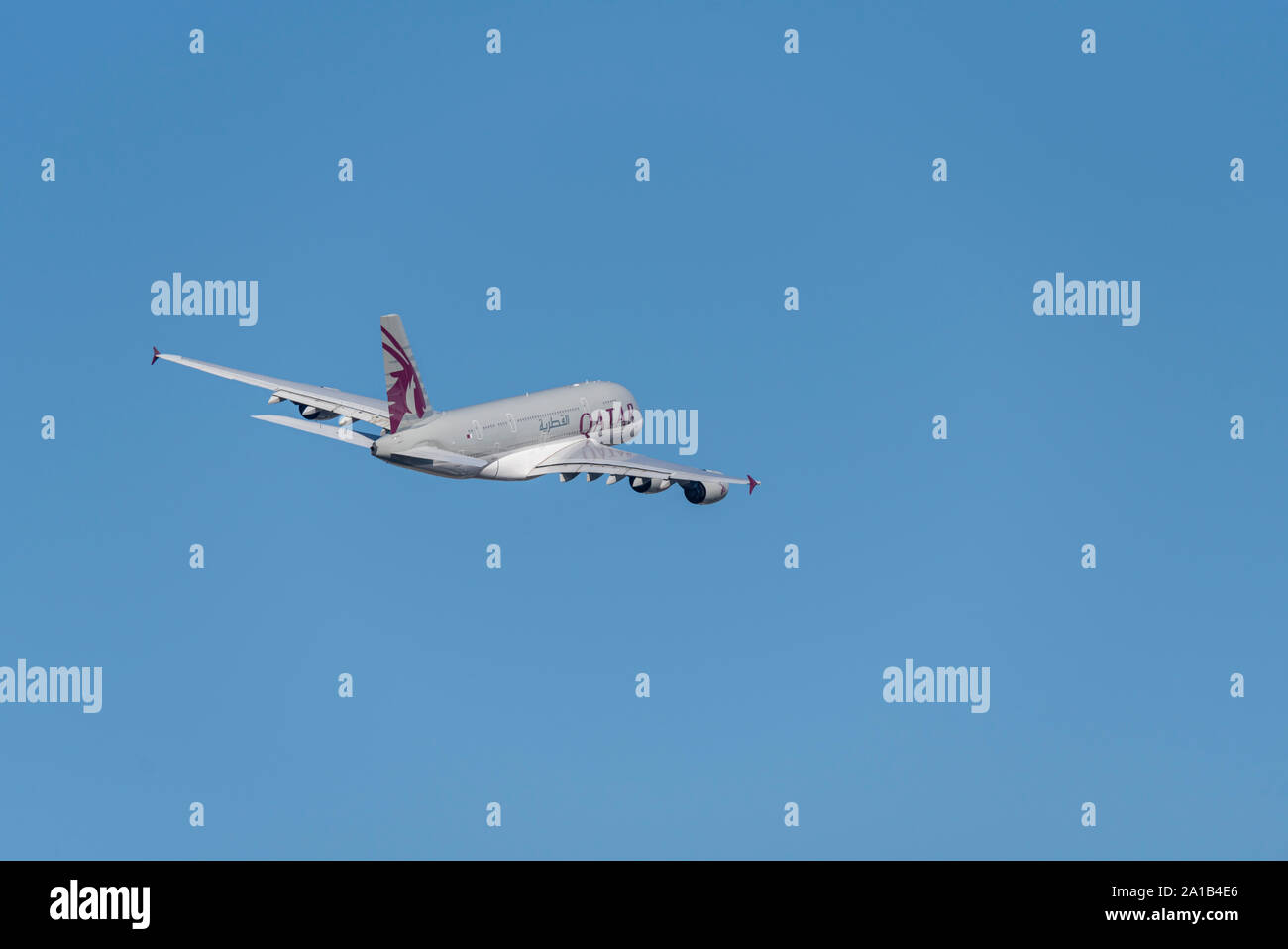 QATAR Airbus A380 super jumbo jet airliner plane A7-APB taking off from London Heathrow Airport, London, UK in blue sky Stock Photo