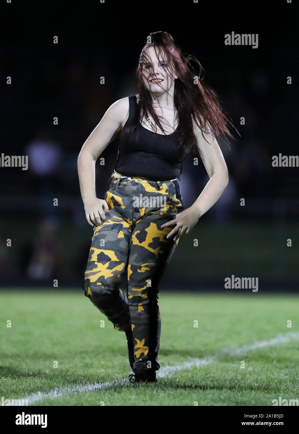 Post Falls High School Dance Team performing during a football game in Post Falls, Idaho. Stock Photo
