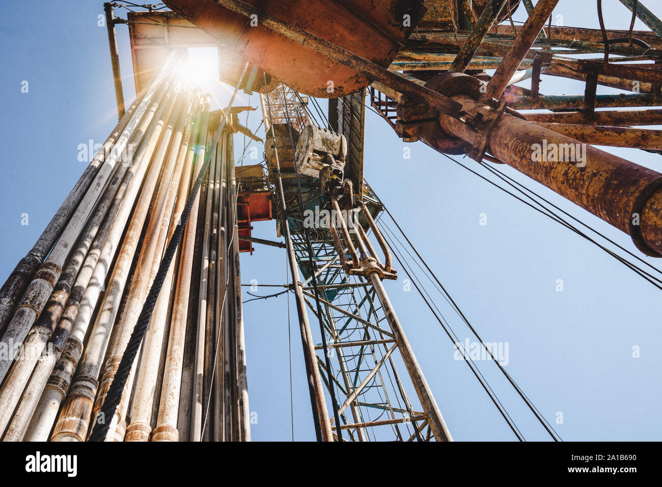 Drilling rig in oil field for drilled into subsurface in order to produced crude, inside view. Petroleum Industry Stock Photo