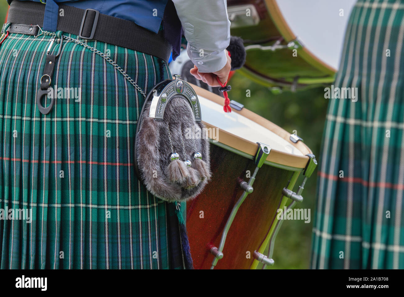 Camelon and district pipe band drummers kilts and sporran at Peebles highland games. Scottish borders, Scotland Stock Photo
