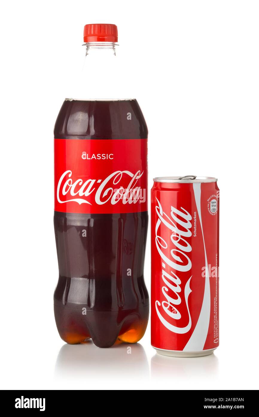 GERMANY - SEPTEMBER 25, 2019 : Coca cola soda beverage PET plastic bottle and can with logo over white background Stock Photo