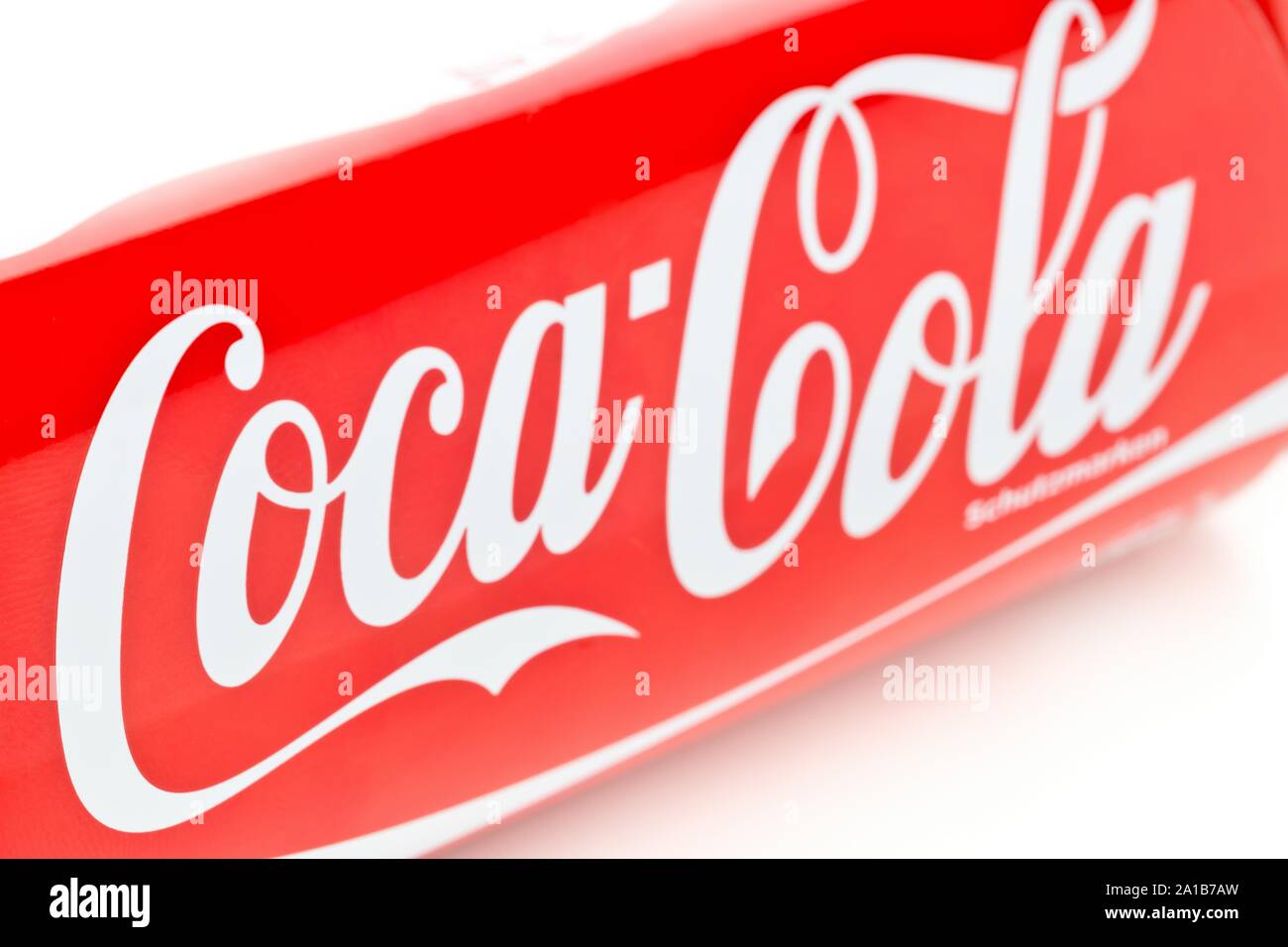 GERMANY - SEPTEMBER 25, 2019 : Coca cola logo close up on soda beverage can with selective focus over white background Stock Photo