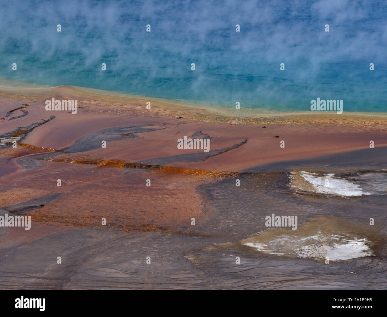 Close-up of steam rising from Grand Prismatic Spring, Midway Geyser Basin, Yellowstone National Park, Wyoming, USA Stock Photo