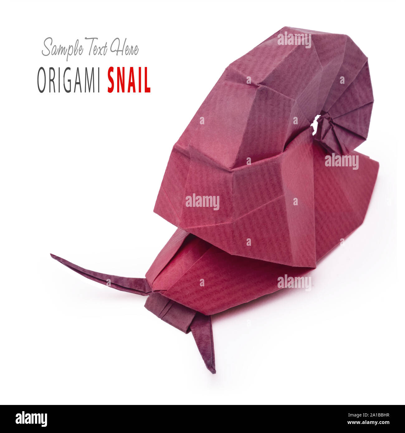 Origami green snail Stock Photo