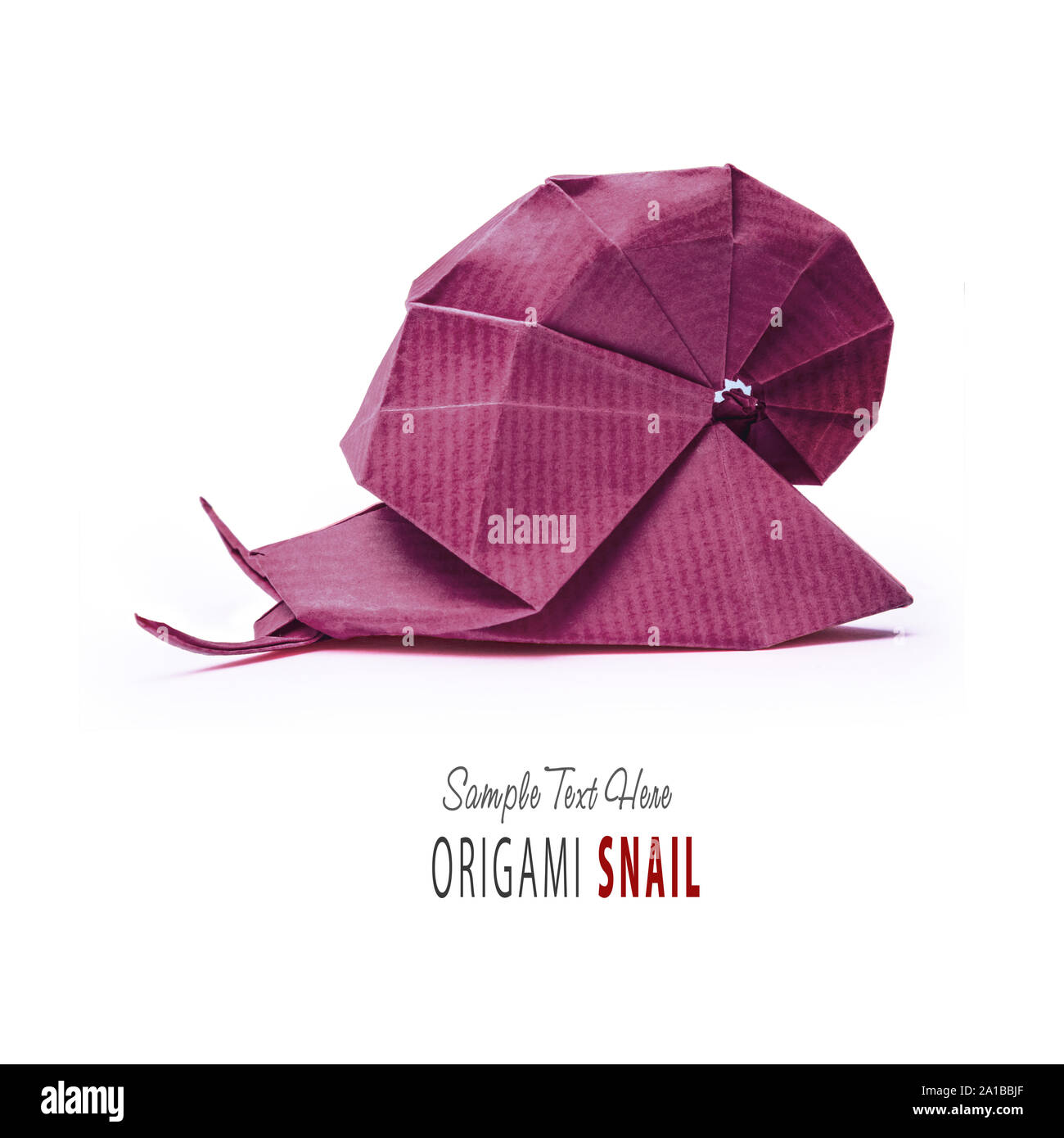 Origami green snail Stock Photo