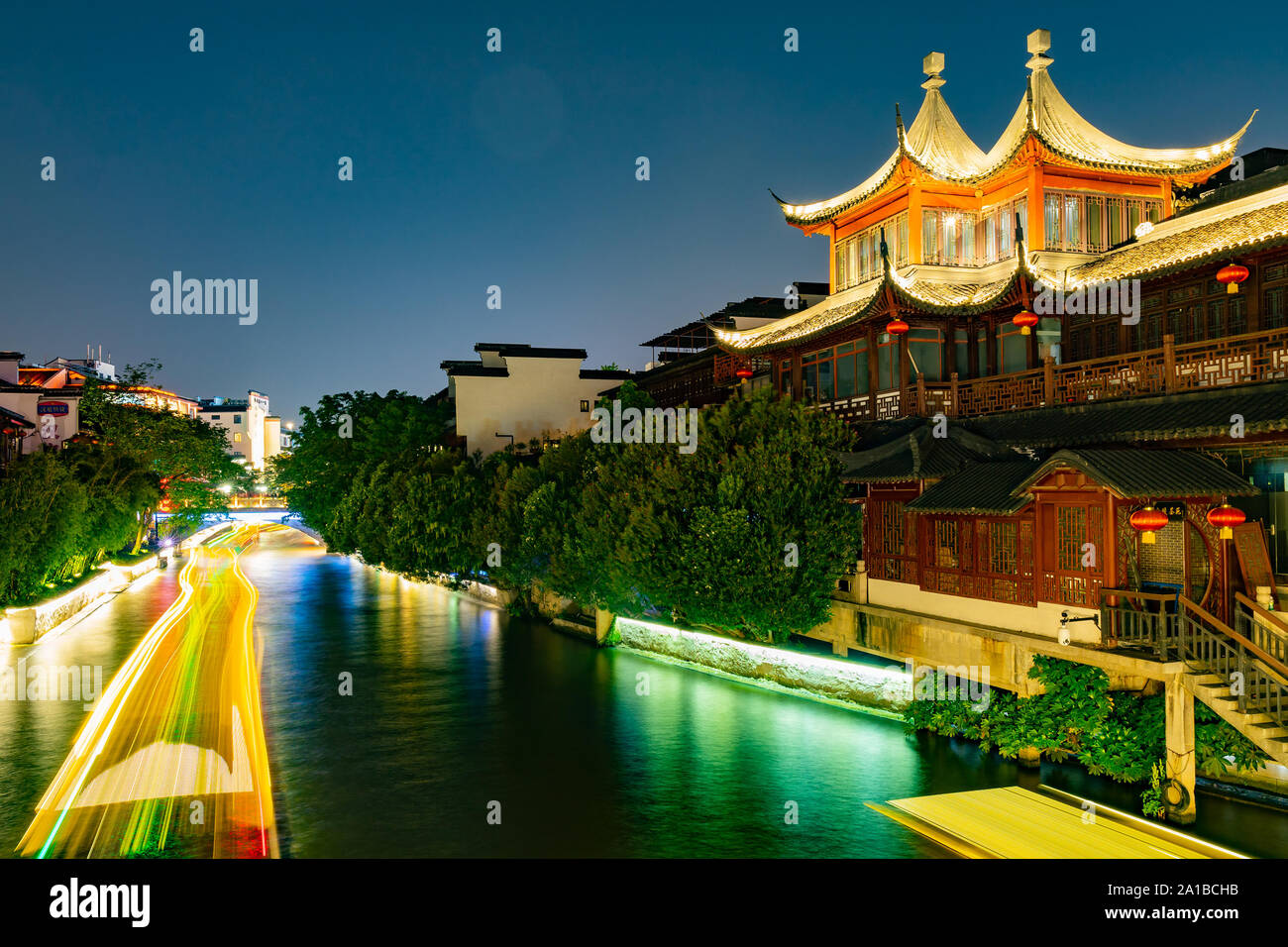 Nanjing Qinhuai River Popular Sightseeing Spot for Visitors Cruising with Ships at Late Night Stock Photo