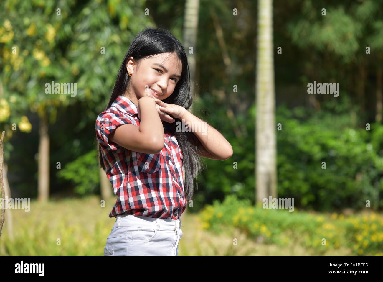 A Petite Female And Happiness Stock Photo