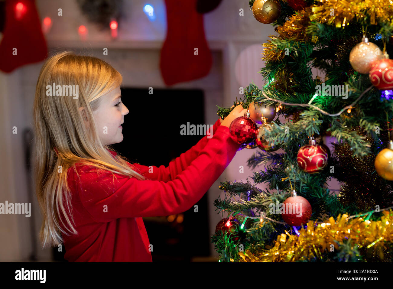 Girl at home at Christmas time Stock Photo