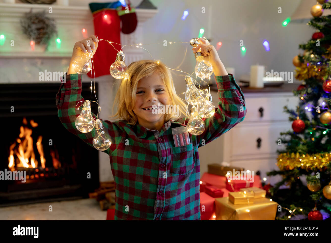 Boy at home at Christmas time Stock Photo