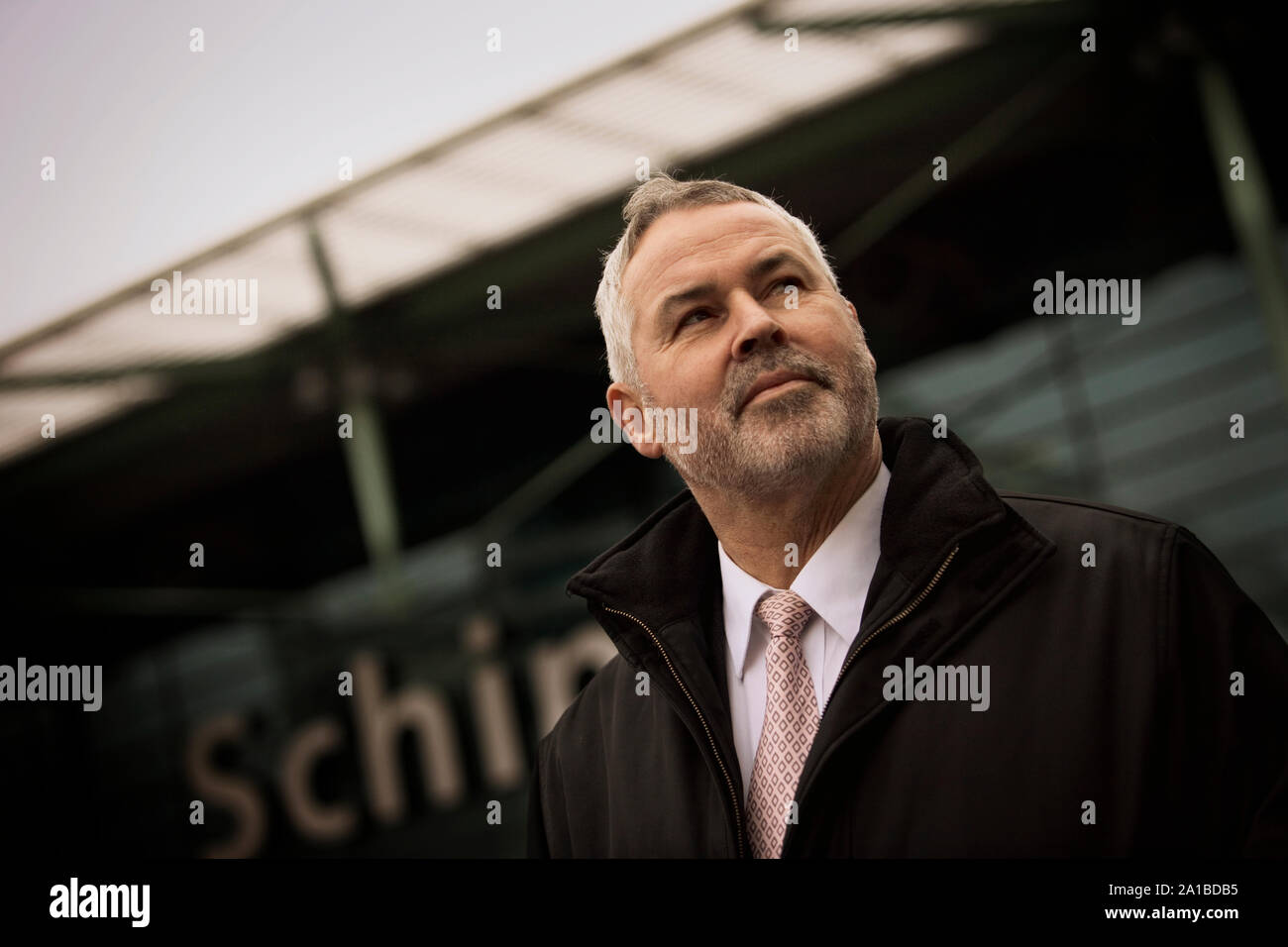 Middle aged man at an airport. Stock Photo