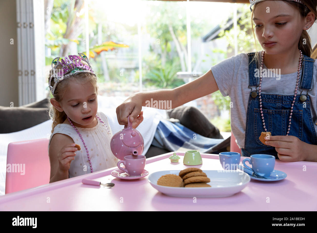 Young girls enjoying time at home Stock Photo