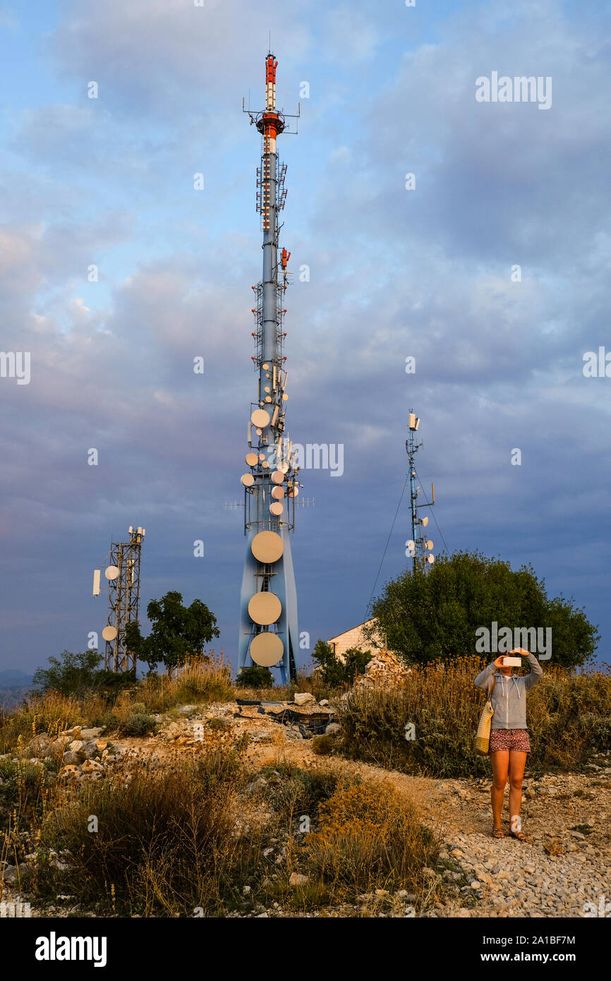 A radio, television, satellite mast at the top of mount Srd, dubrovnik, Croatia. The mast is positioned at a high point for maximum coverage Stock Photo