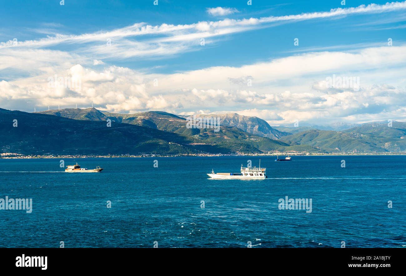 Boats in the Strait of Rion, Greece Stock Photo