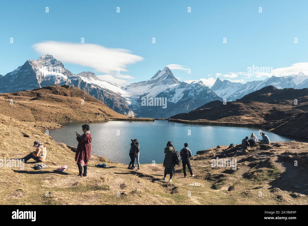 Bachalpsee lake, Switzerland - November 21, 2018: famous tourists attraction in Swiss Alps mountains Stock Photo