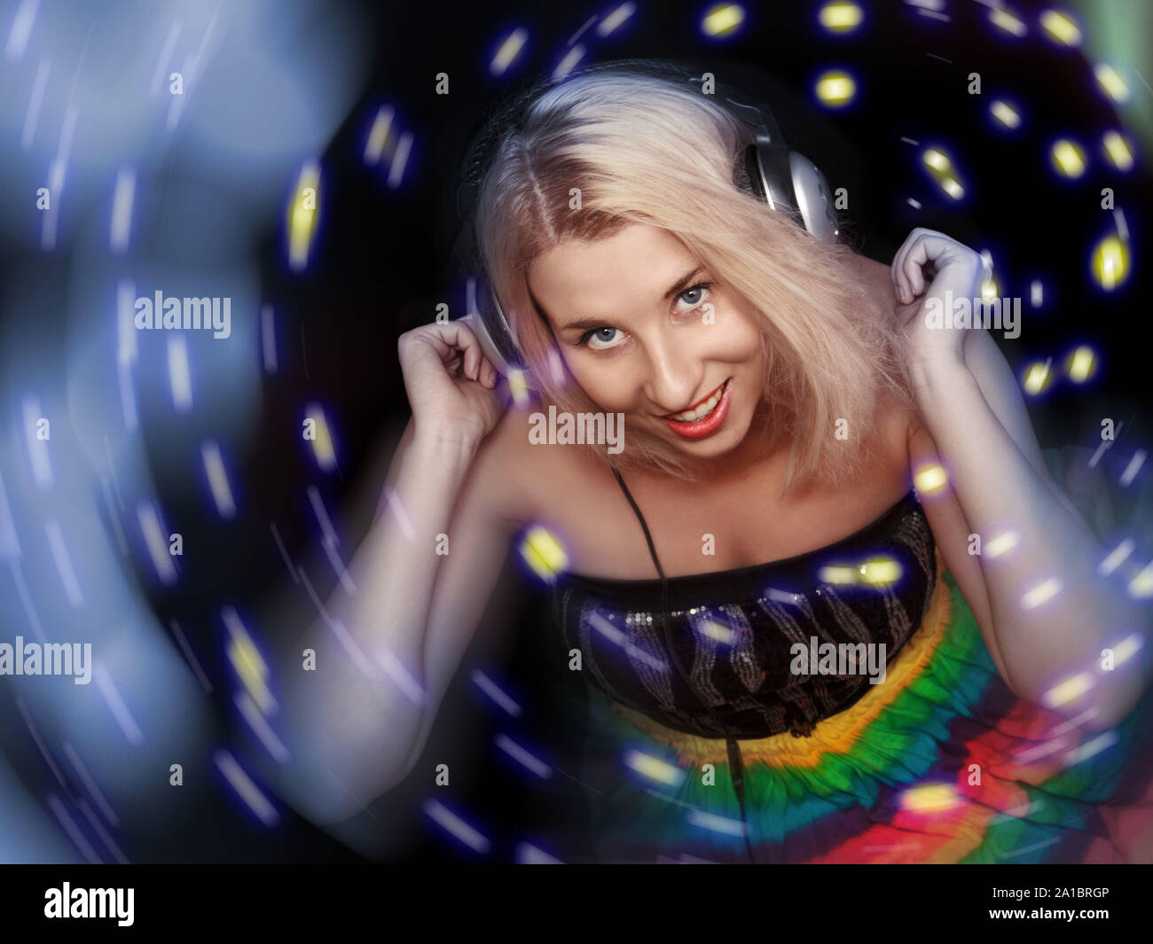 Women dj in headphones Stock Photo - Alamy