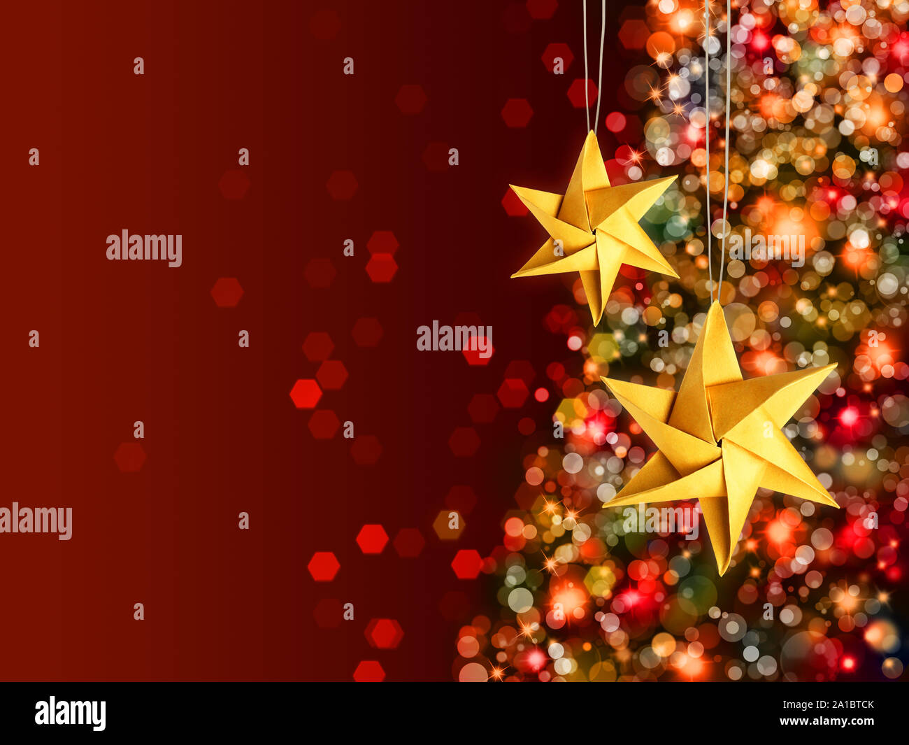Christmas celebration golden stars Stock Photo - Alamy