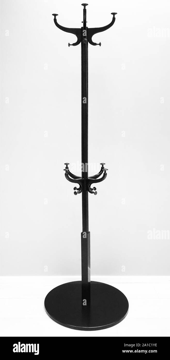 empty solitary coat-rack, black on white Stock Photo