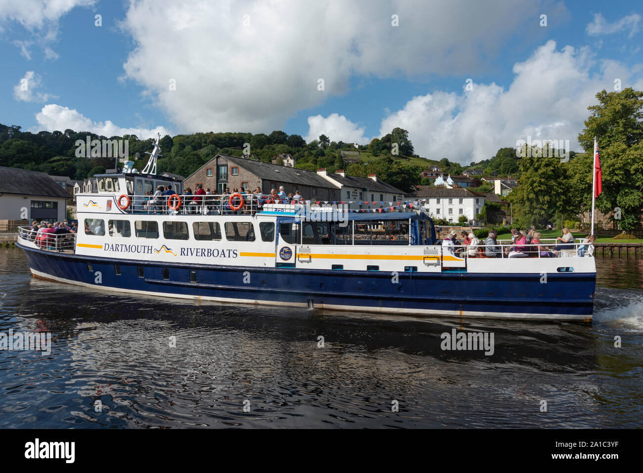 River boat leaving Steamer Quay in Totnes for a trip down the river to