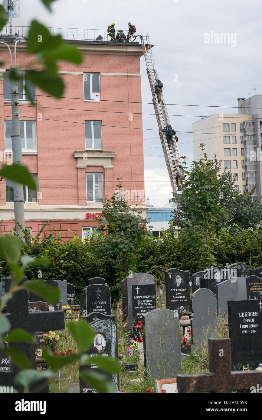 St.Petersburg, Russia - August 14, 2019 - Fire in office centre 'Leningrad', firefighters and emergency services at the scene Stock Photo