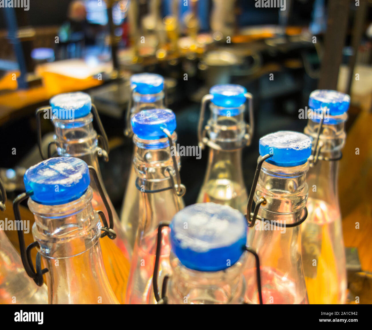 Closeup of blue glass bottle tops and stoppers Stock Photo