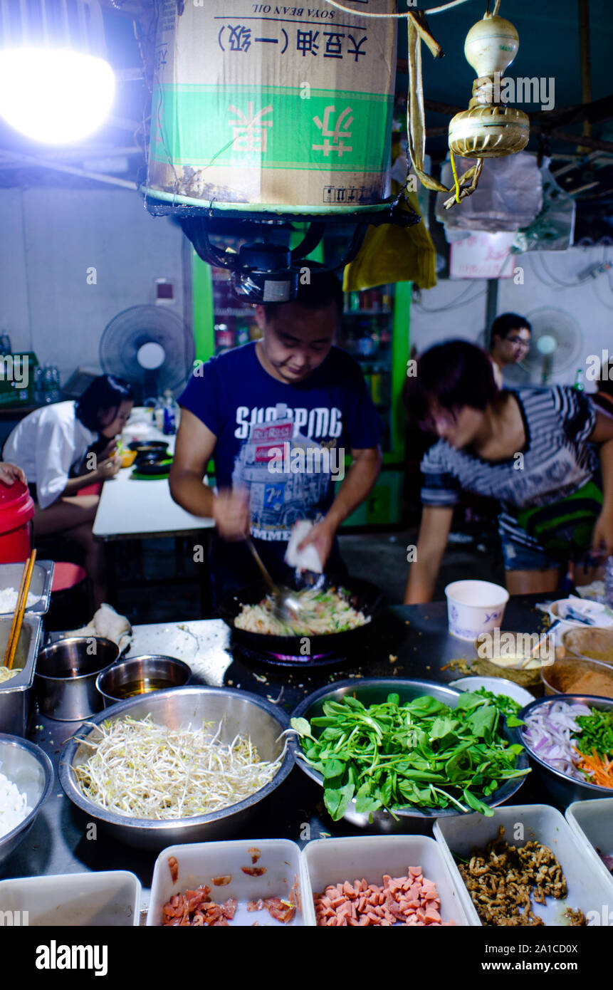 Late night street food at a night market Stock Photo