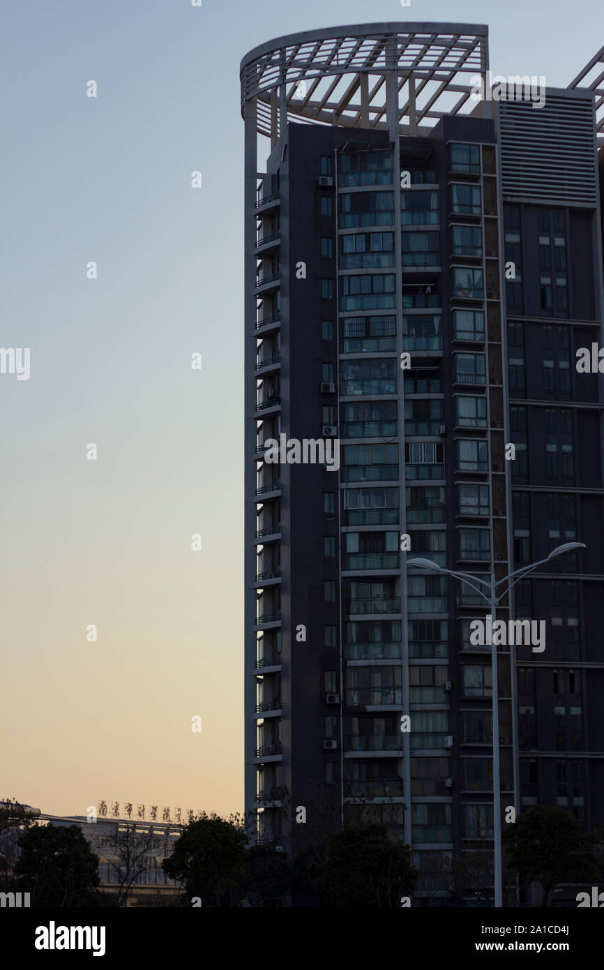 Sunset on a set of apartment blocks Stock Photo