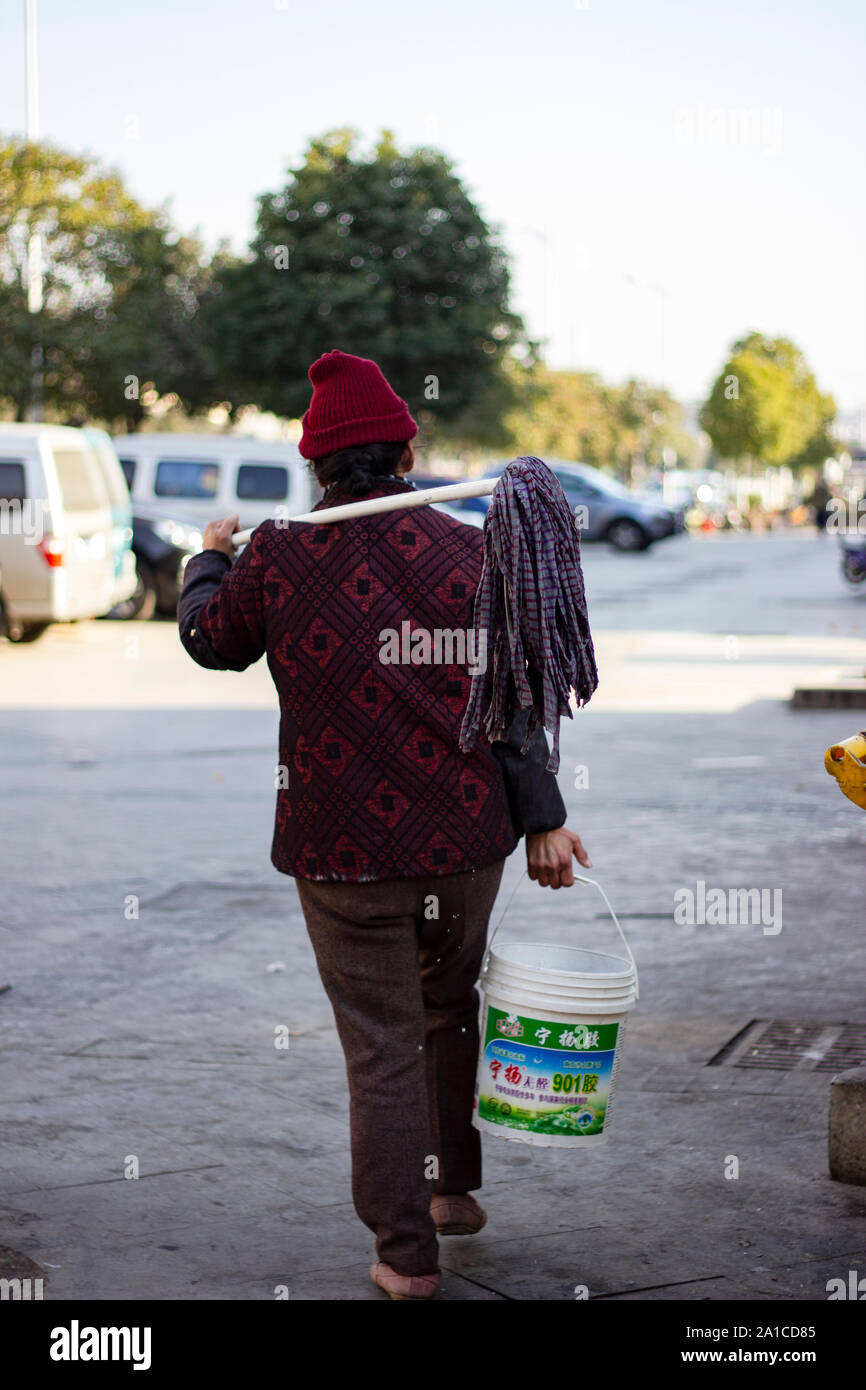 Chinese cleaning lady hi-res stock photography and images - Alamy