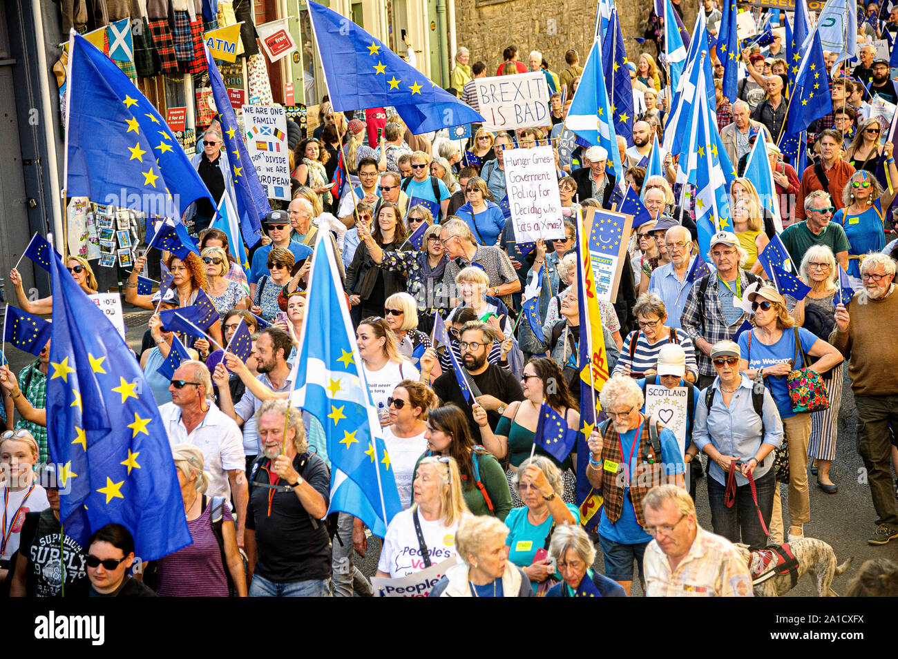 Protesters holding placards and flags during the march.Organized by European Movement in Scotland as well as Edinburgh For Europe, protesters took to the streets of Edinburgh to demand MPs revoke Article 50 to prevent a no-deal and that the EU shares a notion to combat climate change. Stock Photo