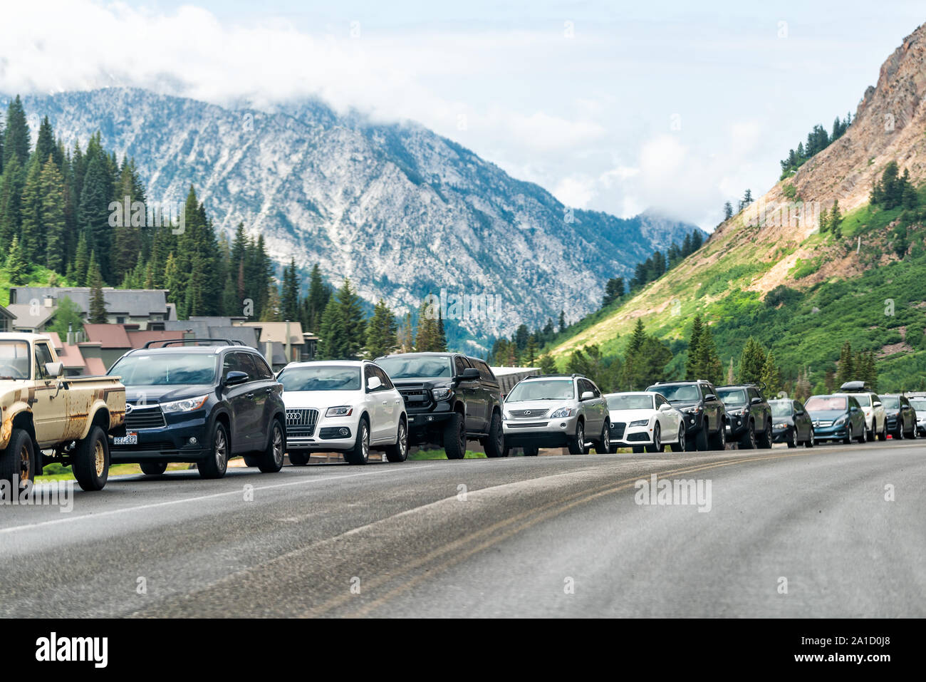 Alta, USA July 27, 2019 Cars parked on side of the road for hiking