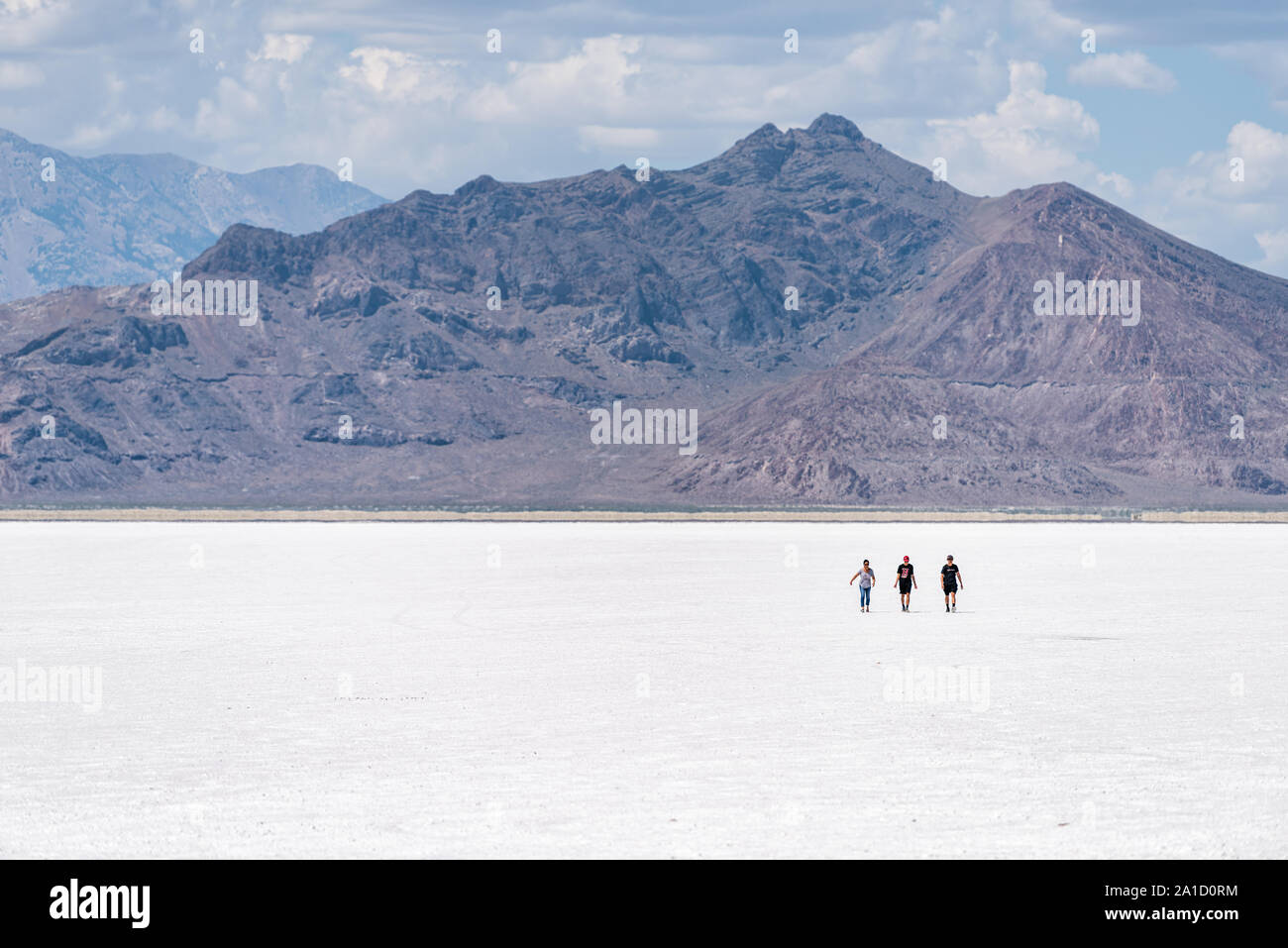 Wendover, USA - July 27, 2019: View of White Bonneville Salt Flats near Salt Lake City, Utah during day with people walking Stock Photo