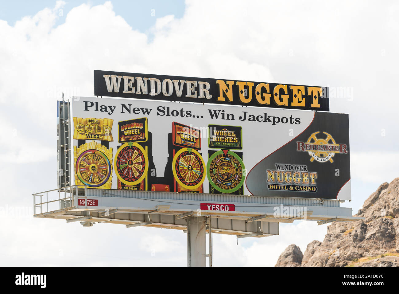 Wendover, USA - July 27, 2019: Nevada city near Bonneville Salt Flats in Utah during day with billboard for famous Nugget Casino on highway road Stock Photo