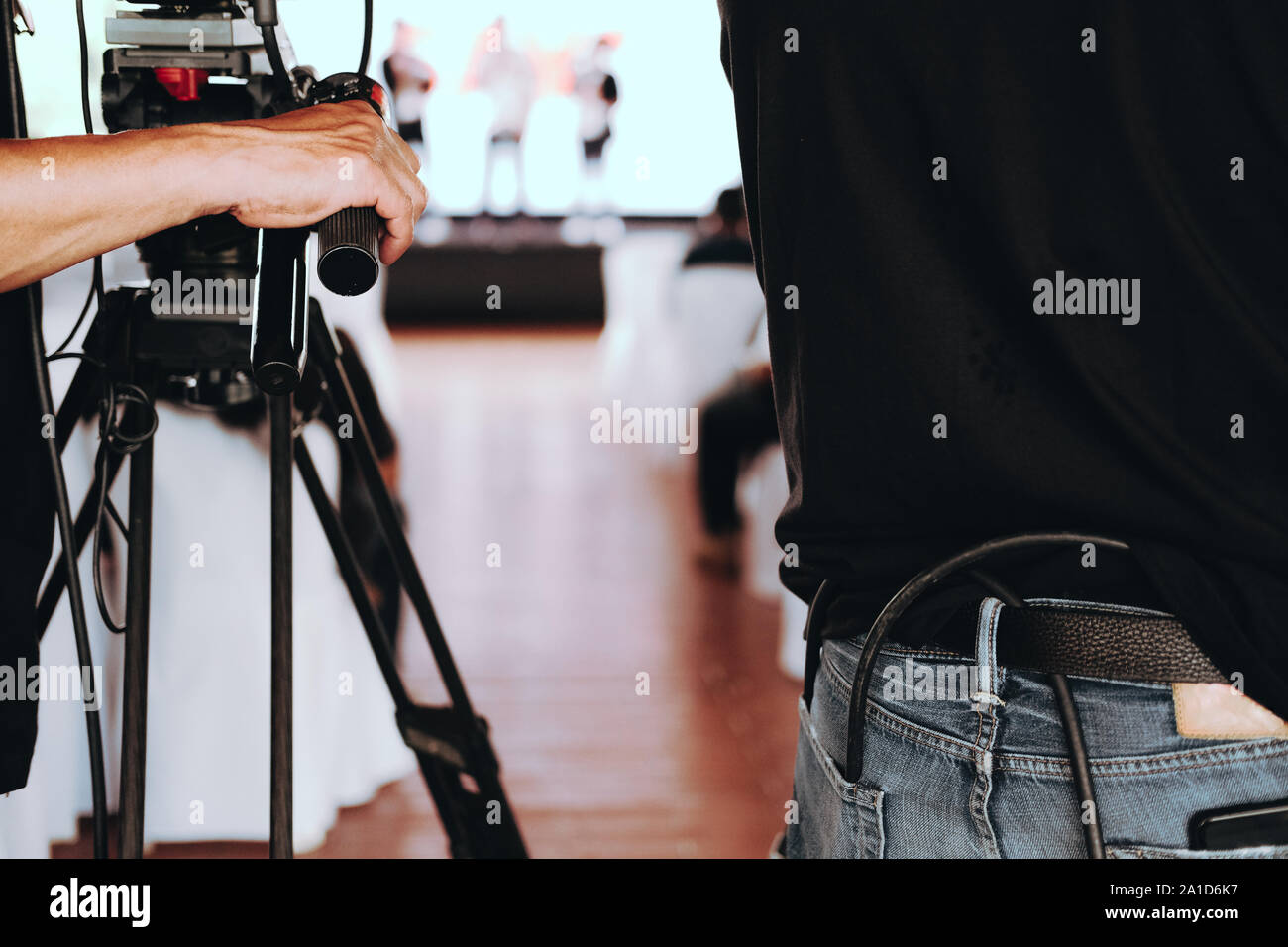 professional video production camera recording live event on stage