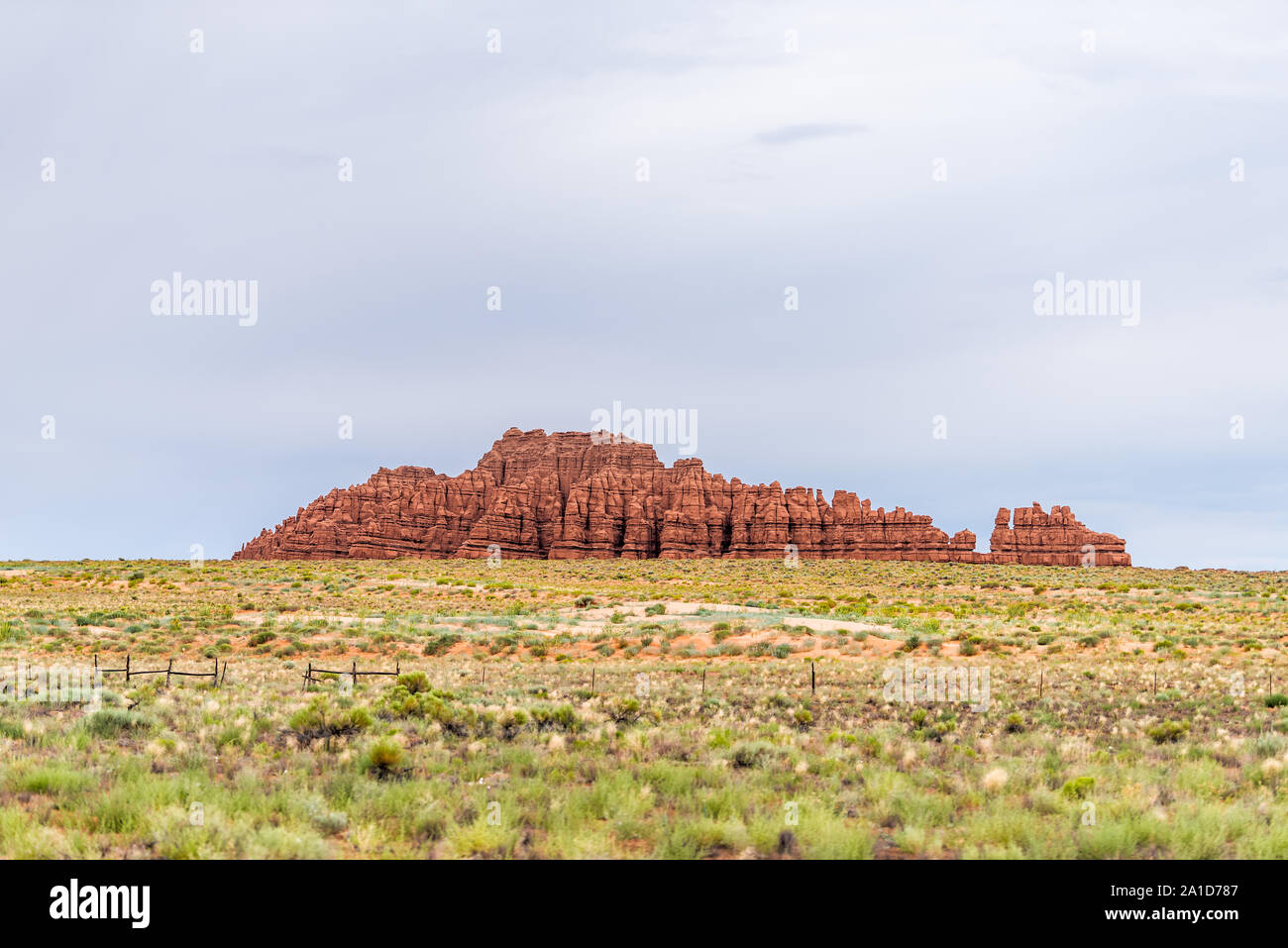 Butte Mesa cliffs with orange color on horizon landscape view near Goblin Valley State Park in Utah in summer day Stock Photo