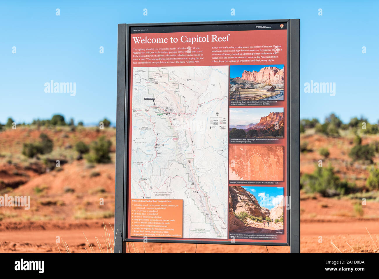 Fruita, USA - August 1, 2019: Welcome sign in Capitol Reef National Monument in summer with map and guide Stock Photo
